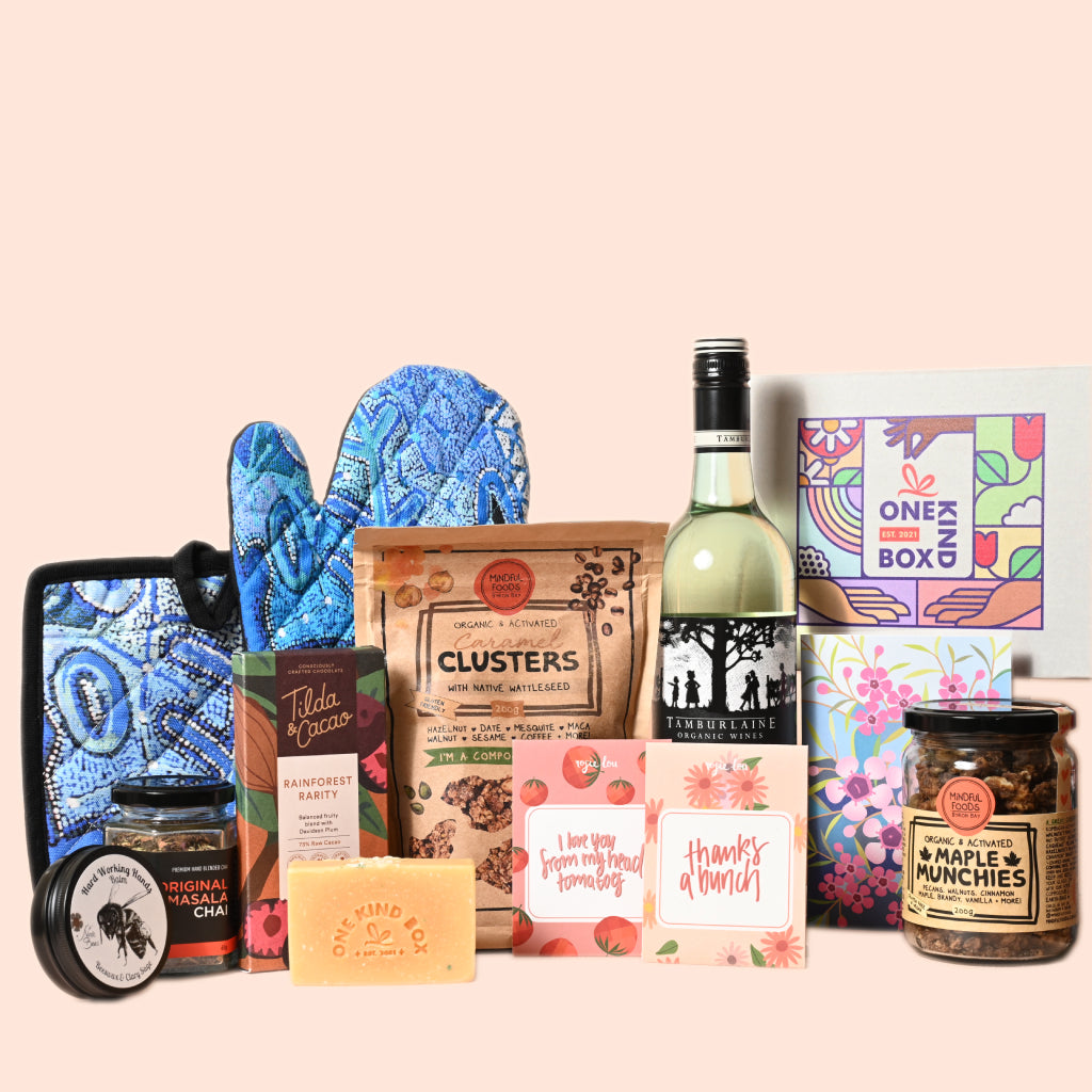 Father's Day Gift Hamper by One Kind Box. Includes premium Australian dark chocolate, Vegan Organic Australian Wine, gourmet tea, a jar of maple munchies to snack on and a range of ethical gifts dad will love. Shop our dad hampers and dad gifts at One Kind Box.