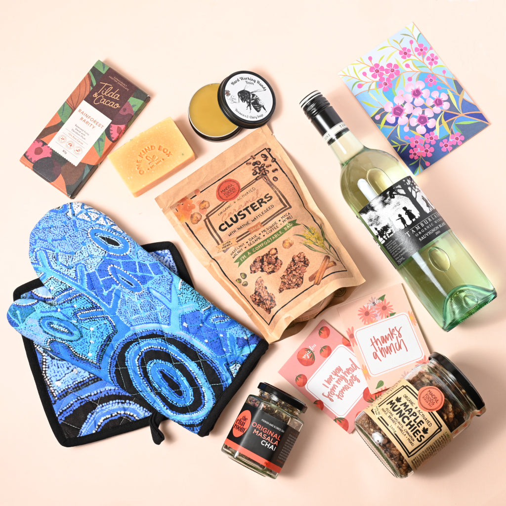 Father's Day Gift Hamper by One Kind Box. Includes premium Australian dark chocolate, Vegan Organic Australian Wine, gourmet tea, a jar of maple munchies to snack on and a range of ethical gifts dad will love. Shop our dad hampers and dad gifts at One Kind Box.